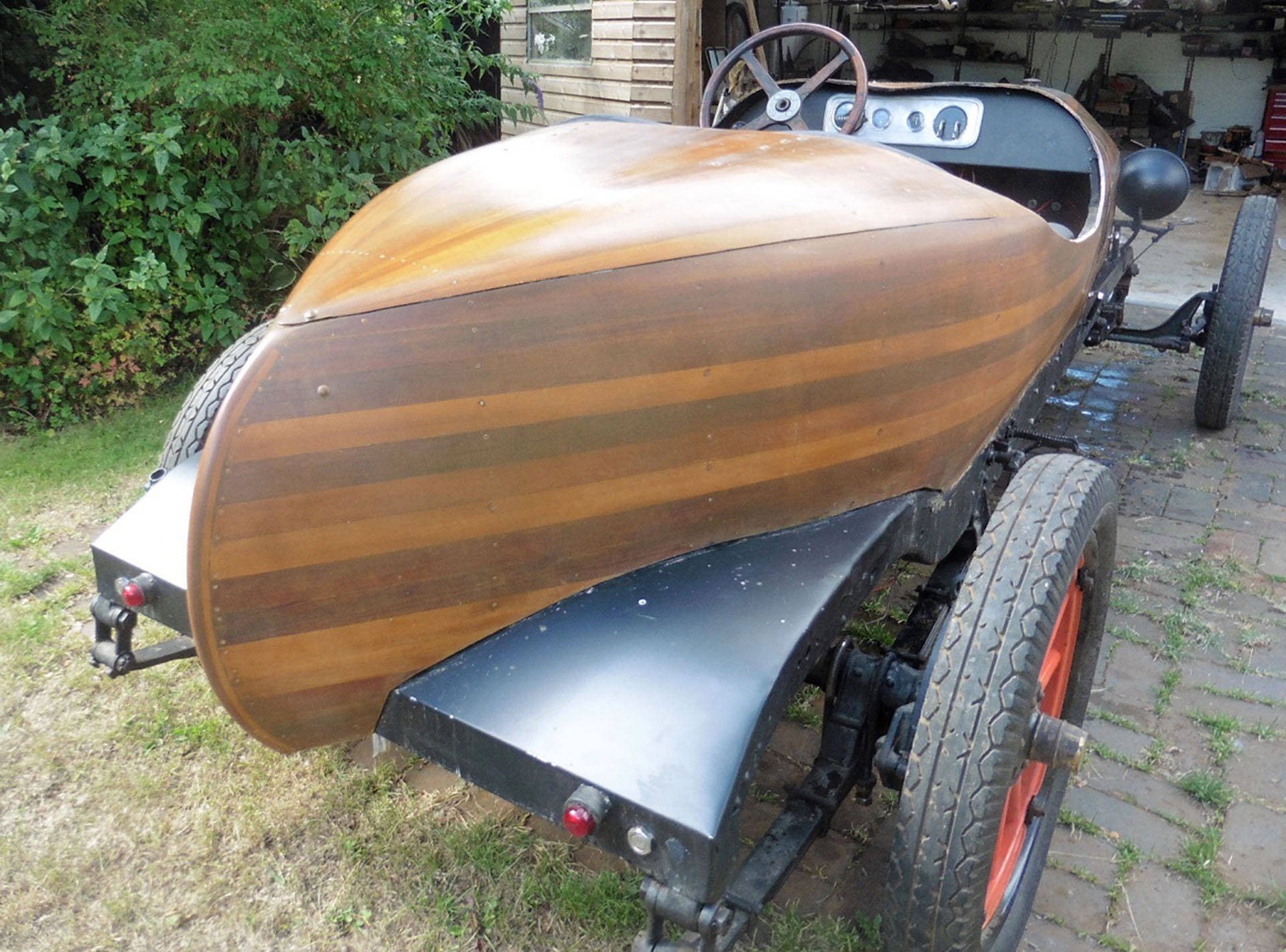 Car with cedar strip body